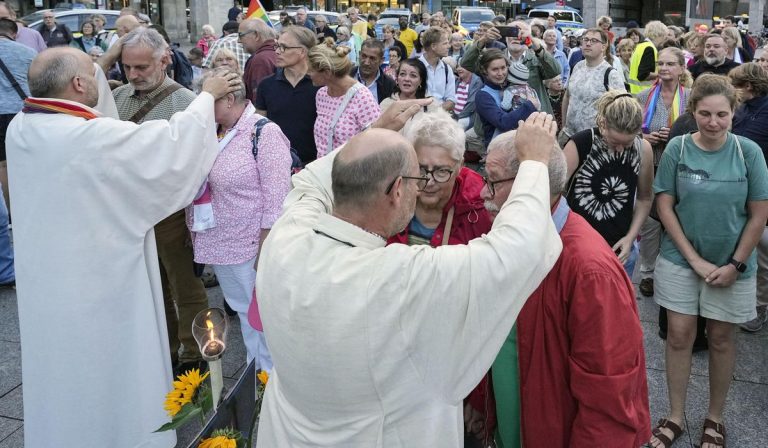 Pope Francis formally approves priests to bless same-sex marriages